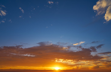 Sunrise or sunset sky with clouds