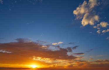 Sunrise or sunset sky with clouds