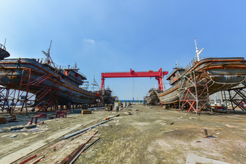 Close-ups of various vessels undergoing maintenance and repair