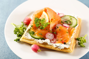 waffle with cheese, salmon and vegetable