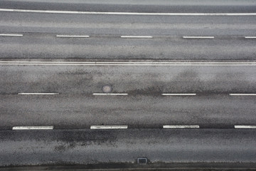 road with asphalt pavement and markings, top view
