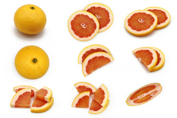 grapefruit - set of fresh whole and sliced grapefruits  isolated on white