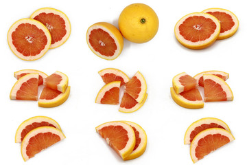 grapefruit - set of fresh whole and sliced grapefruits  isolated on white