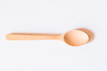 wooden spoon and chopstick on isolated white background
