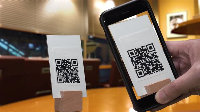 Scanning QR CODE look alike pattern (CAN NOT SCAN THIS) via smart phone at the store.