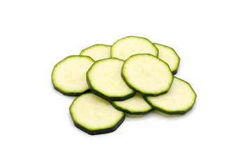  fresh zucchini slices - isolated on white