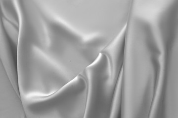Rippled white silk fabric satin cloth waves background