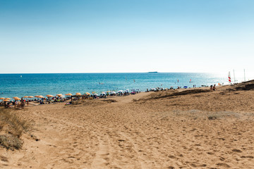 Fototapeta na wymiar A view of dunes on Corfu, Greece, one of the Island's most popular resorts