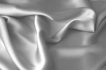 Plakat Rippled white silk fabric satin cloth waves background