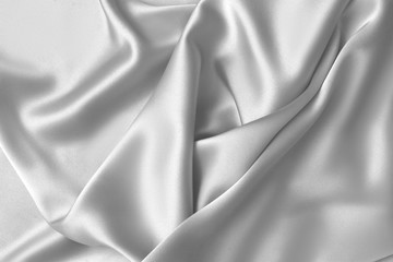 Rippled white silk fabric satin cloth waves background