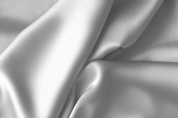 Rippled white silk fabric satin cloth waves background