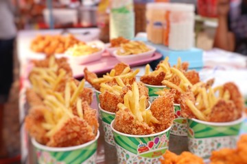 French fries and fried chicken at market