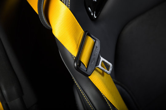 Close Up Of Yellow Car Seat Belt