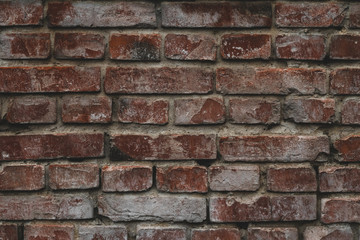 Old vintage red brick wall. Red brick wall texture. Old red urban brick wall background.