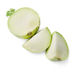 Half a kohlrabi cabbage and two quarters on a white isolated background. Close-up. Top view.