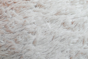 soft white fur fabric background.