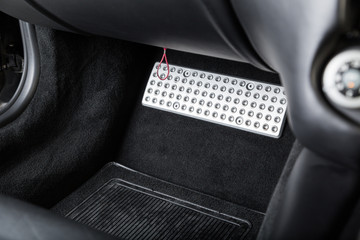 Chrome leg rest in car interior
