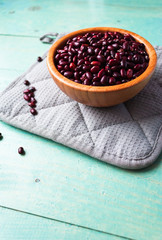 Dried red beans in bamboo bowl