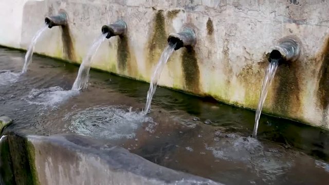 Slowmotion video of La Jaula fountain, Monda, Malaga, Spain
