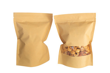 Popcorn caramel in brown kraft zip lock bag on white background.