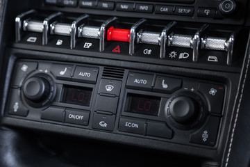 Close up of temperature control panel in sports car interior