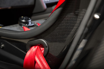 Close up of carbon fibre bucket racing car seat