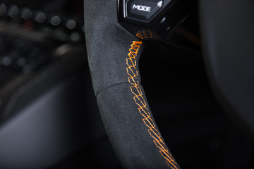 Close up of car steering wheel