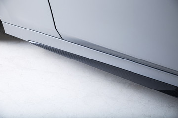 Side skirt on a silver car