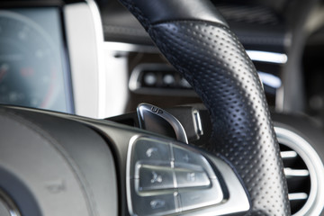 Paddle shifting in sports car steering wheel