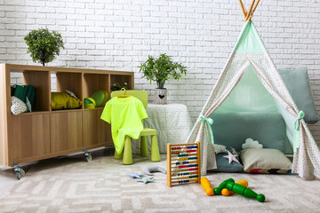 Stylish interior of kid room with hovel