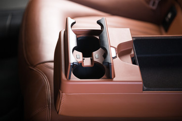 Cup compartment in luxury car interior
