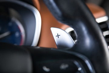 Paddle shifting in sports car steering wheel