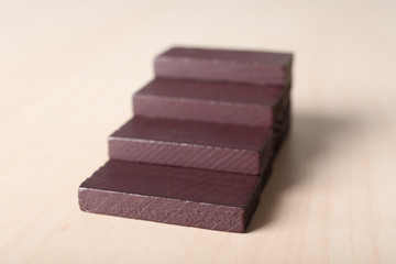 Stacked blocks on wooden table. Concept of career