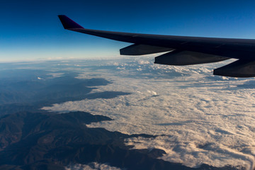 Fototapeta premium Clouds sky looking from the plane