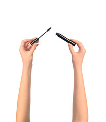 mascara brush in women hends isolated, make up concept