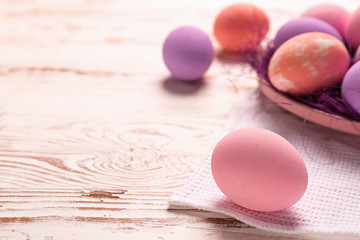 Obraz na płótnie Canvas Easter eggs on wooden table