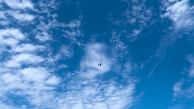 Drone flying trough the sky - slow motion