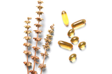 Plant based pills on light background