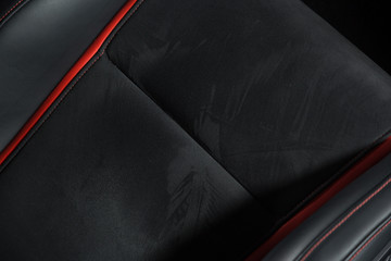Close up of black car seat with contrast stitching - obrazy, fototapety, plakaty