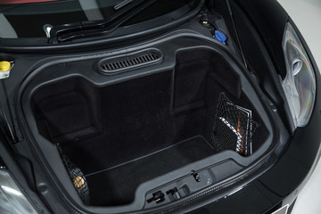 Fototapeta na wymiar Storage compartment of sports car