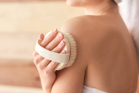 Beautiful Young Woman With Massage Brush On Wooden Background, Closeup