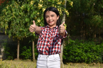 Minority Tween With Thumbs Up