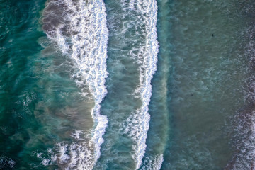 Aerial view of ocean waves near the shore, Bali, Indonesia