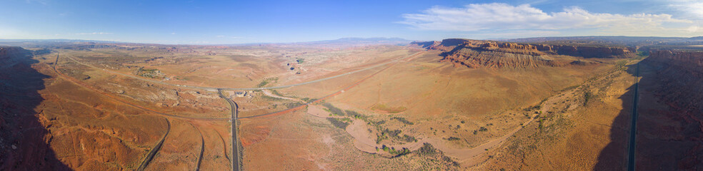 Fototapeta na wymiar Mesa and canyon landscape panorama aerial view near Arches National Park, Moab, Utah, USA.