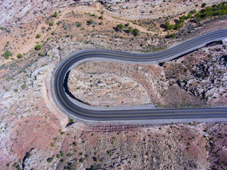 Mesa and canyon landscape and Utah State Route 313 aerial view near Arches National Park, Moab, Utah, USA.