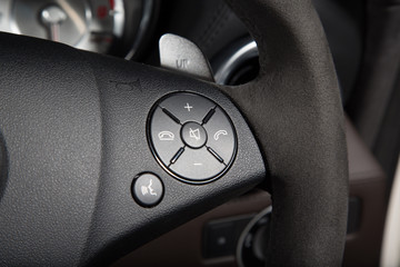 Media controls on steering wheel