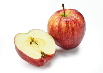 red apple is a storehouse of vitamins on a white background