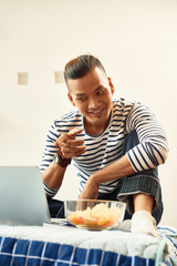 Man joking with friend online