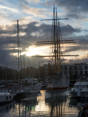 Ostend, Belgium - December, 2018: Picture the training ship Mercator, located in the marina in Ostend. Sunset