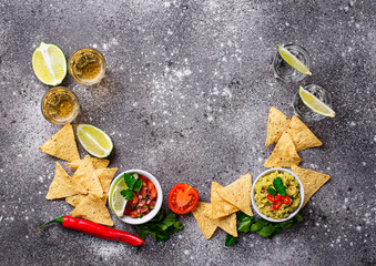 Guacamole, salsa, chips nachos and tequila